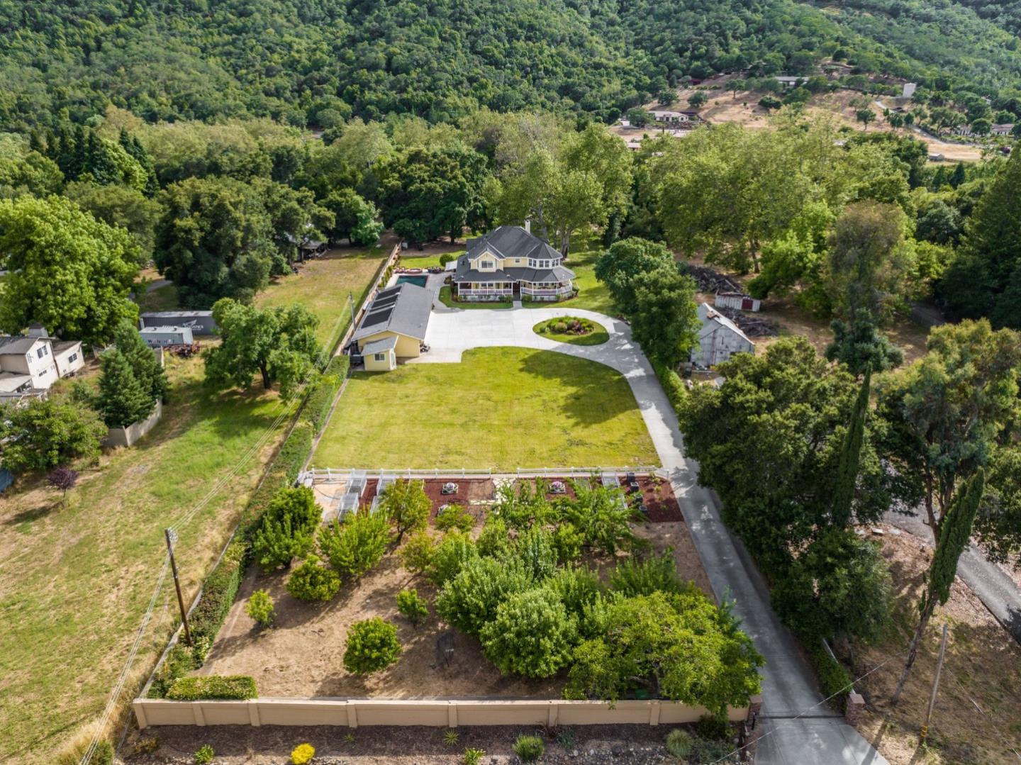 12135 Watsonville Road Gilroy, CA 95020 - Photo 79 of 83 an aerial view of residential houses with outdoor space