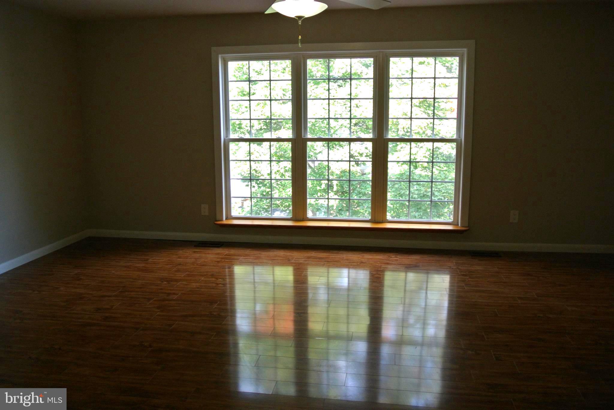 2908 Aspen Hill Road Baltimore, MD 21234 - Photo 5 of 38 Triple windows provide beautiful sunlight