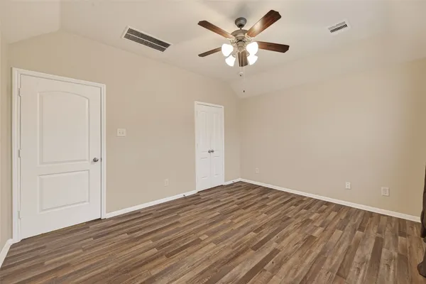 a view of a room with racks on the wall