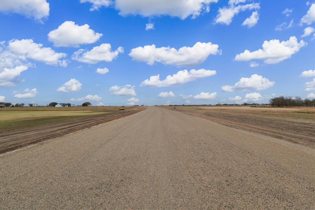 Lot 18 High Meadow Road Elm Mott, TX 76640 - Photo 10 of 12 a view of an ocean and a building