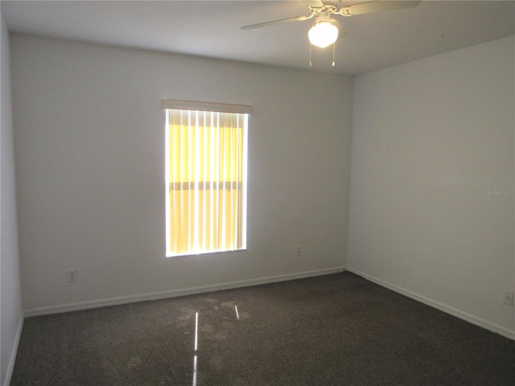4760 Southwest 136th Place Ocala, FL 34473 - Photo 14 of 19 an empty room with a window