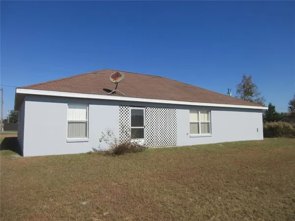 a front view of house with garage