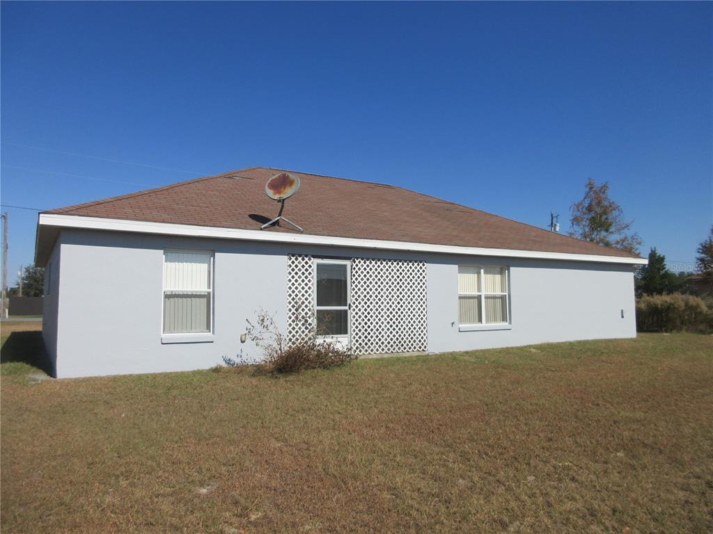4760 Southwest 136th Place Ocala, FL 34473 - Photo 19 of 19 a front view of house with garage