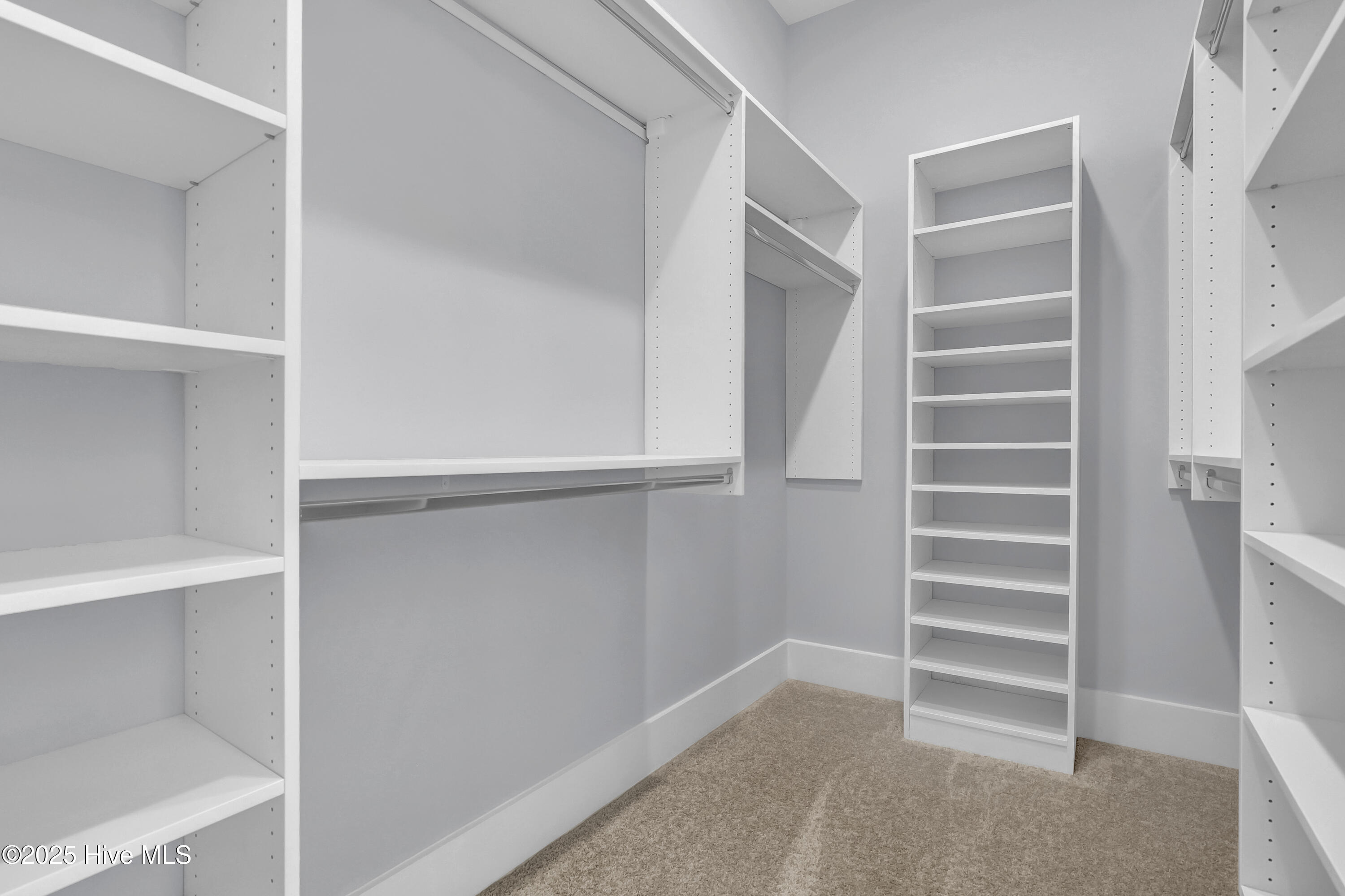 110 Whispering Pine Lane Holly Ridge, NC 28445 - Photo 12 of 28 Primary Walk-in Closet