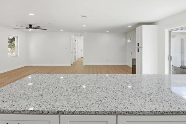 a kitchen with a sink and a window