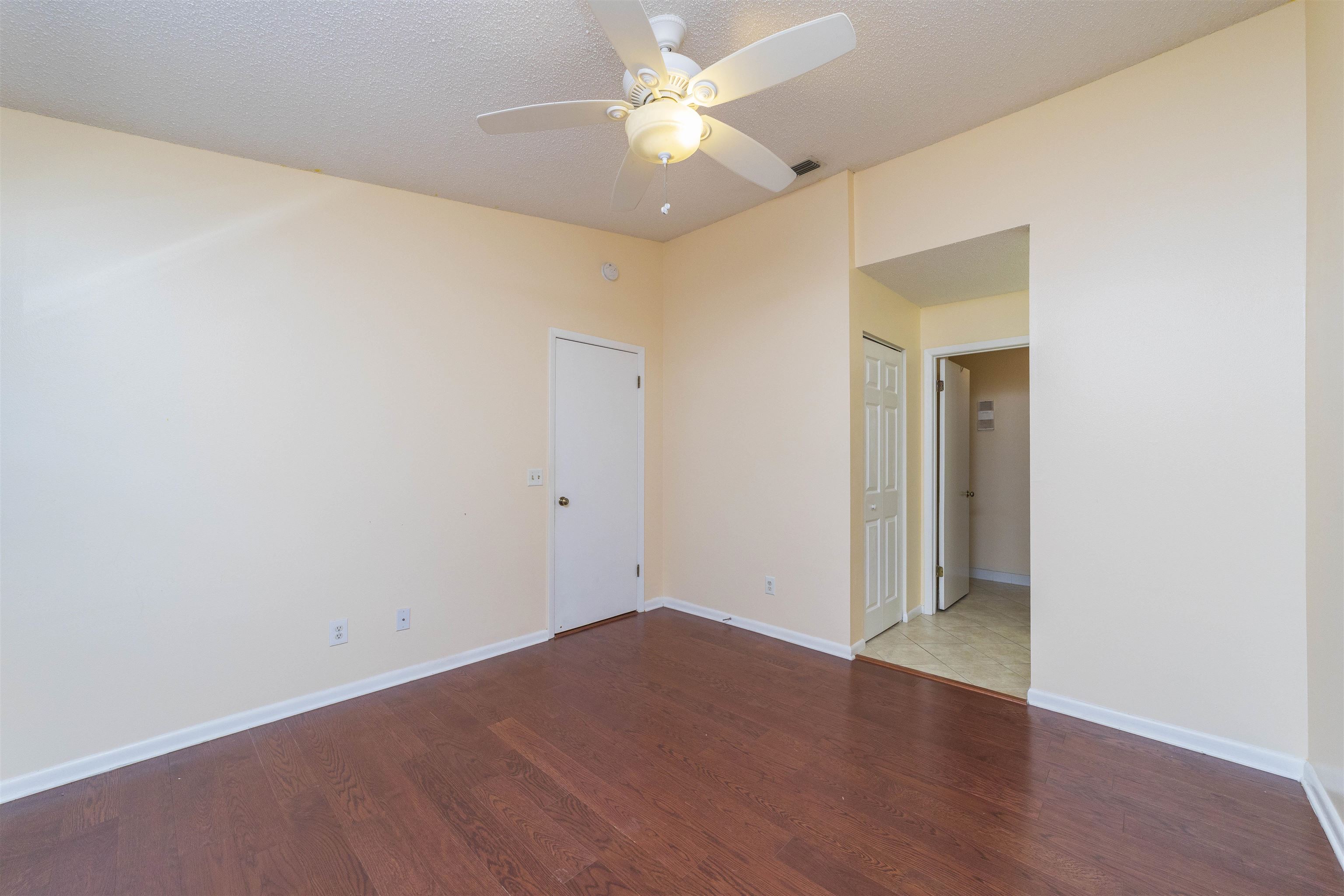 2 Catalonia Court St. Augustine, FL 32086 - Photo 9 of 28 wooden floor in an empty room