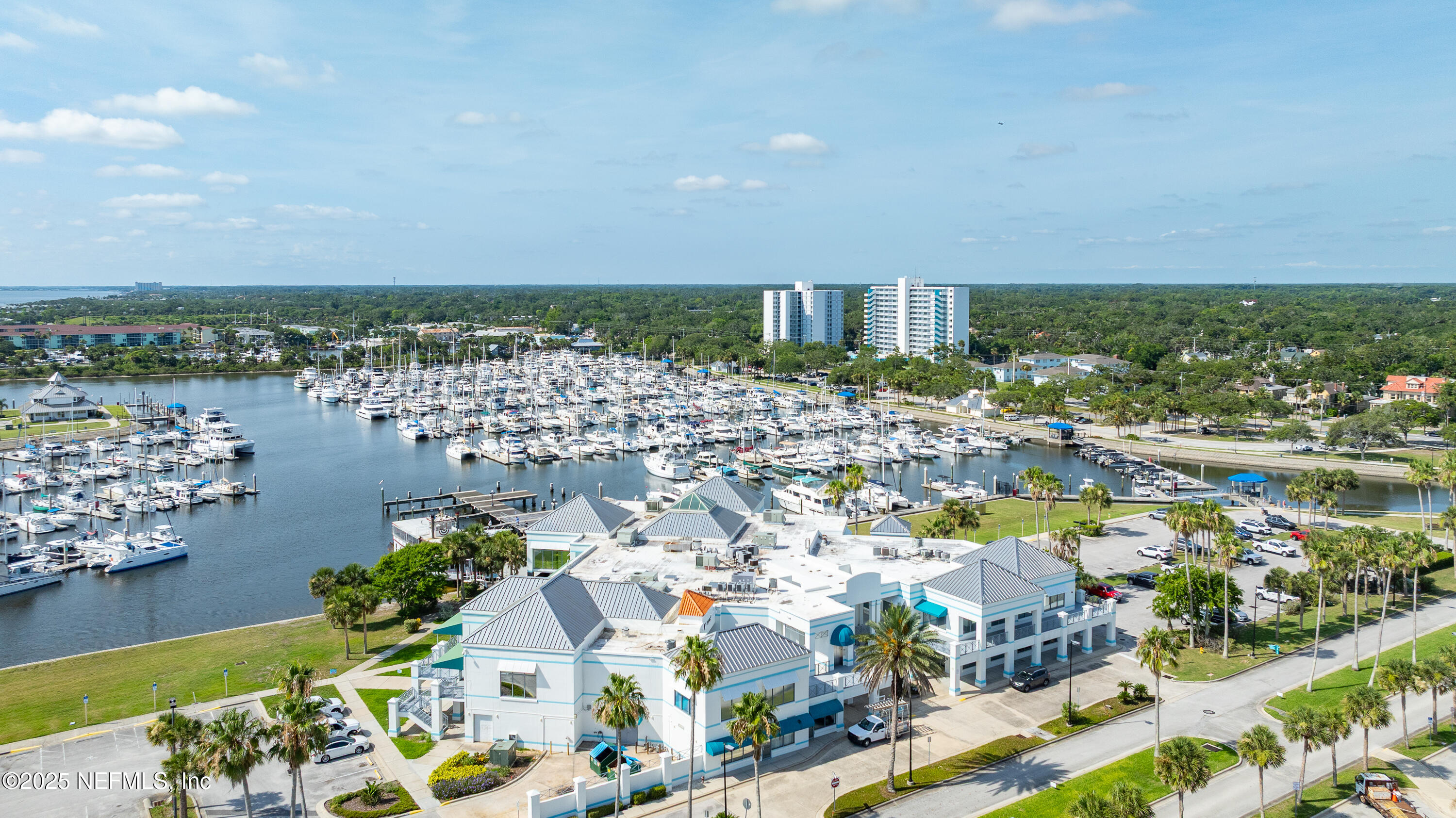 1399 Old Kings Road Daytona Beach, FL 32117 - Photo 16 of 27 a view of a lake with a city
