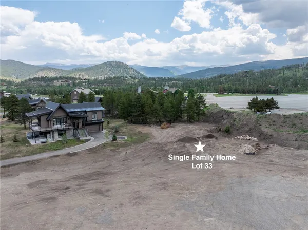 a black and white photo of a living room