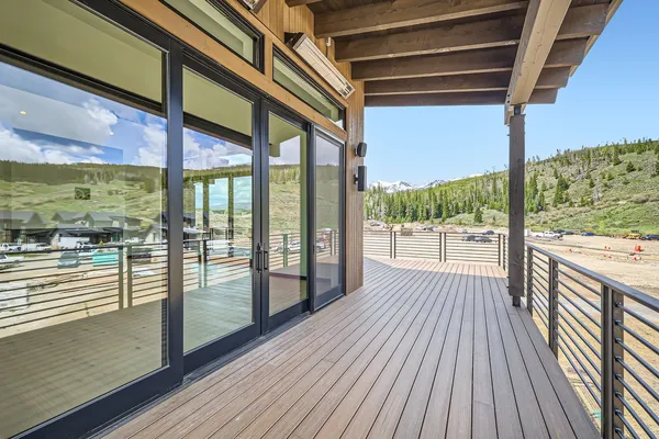 a view of a town with mountains in the background