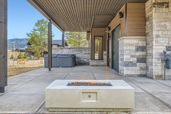 a view of a pool and an outdoor space