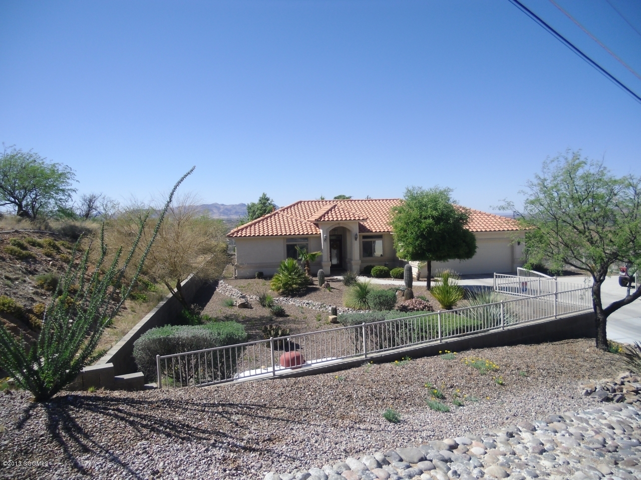 942 Via Puebla Rio Rico, AZ 85648 - Photo 3 of 73 a view of a house with backyard and sitting area