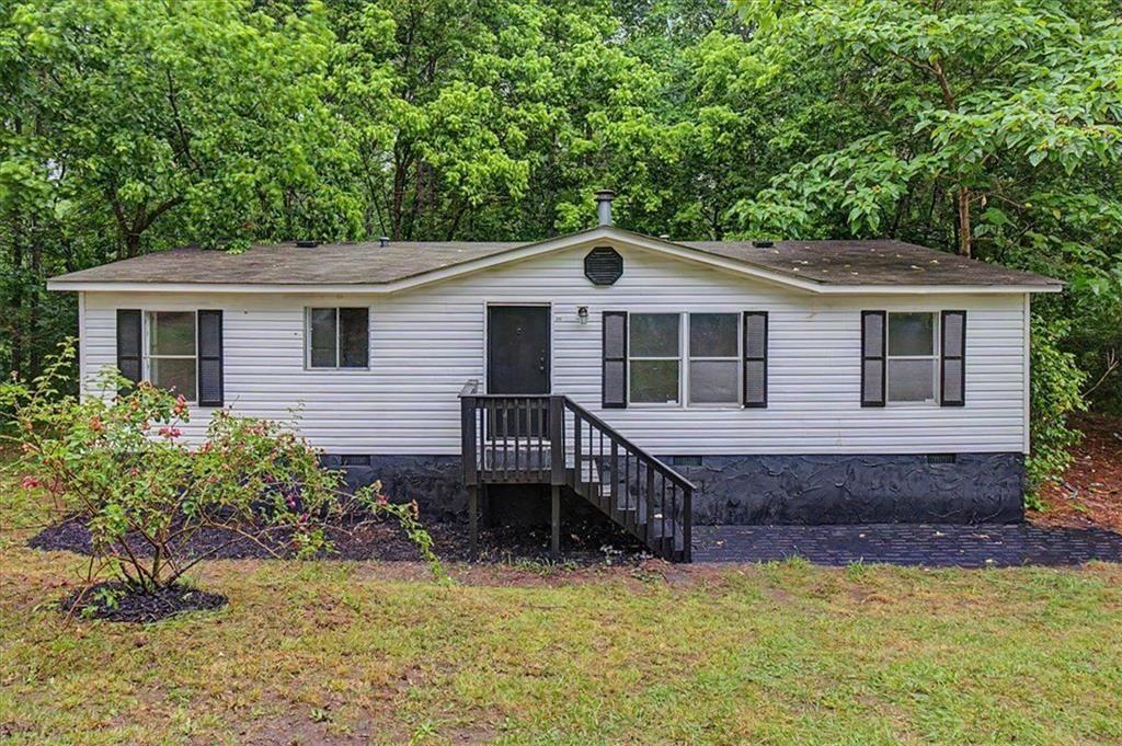 360 Black Knob Church Road Ranger, GA 30734 - Photo 1 of 20 a front view of a house with a yard