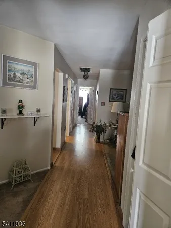 a bathroom with a toilet and a shower curtain