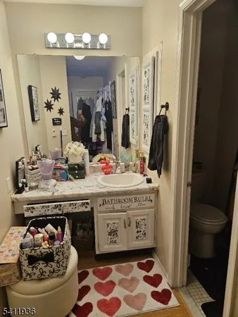 a bathroom with a toilet and a sink