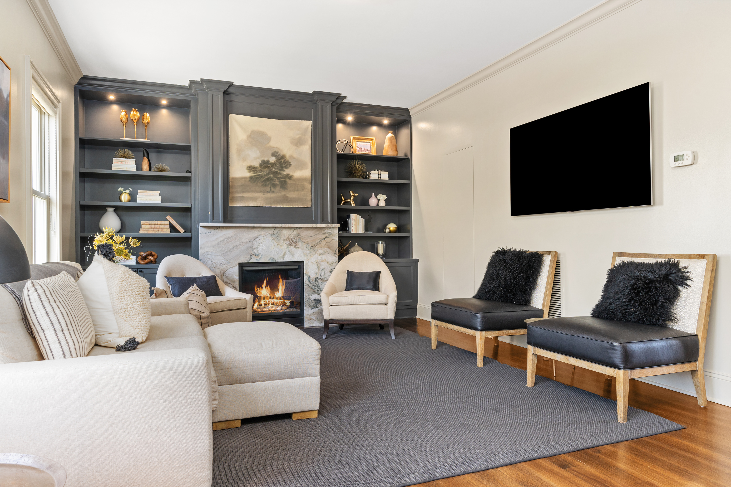 75 Saddle Rock Road Stamford, CT 06902 - Photo 11 of 40 a living room with furniture fireplace and flat screen tv