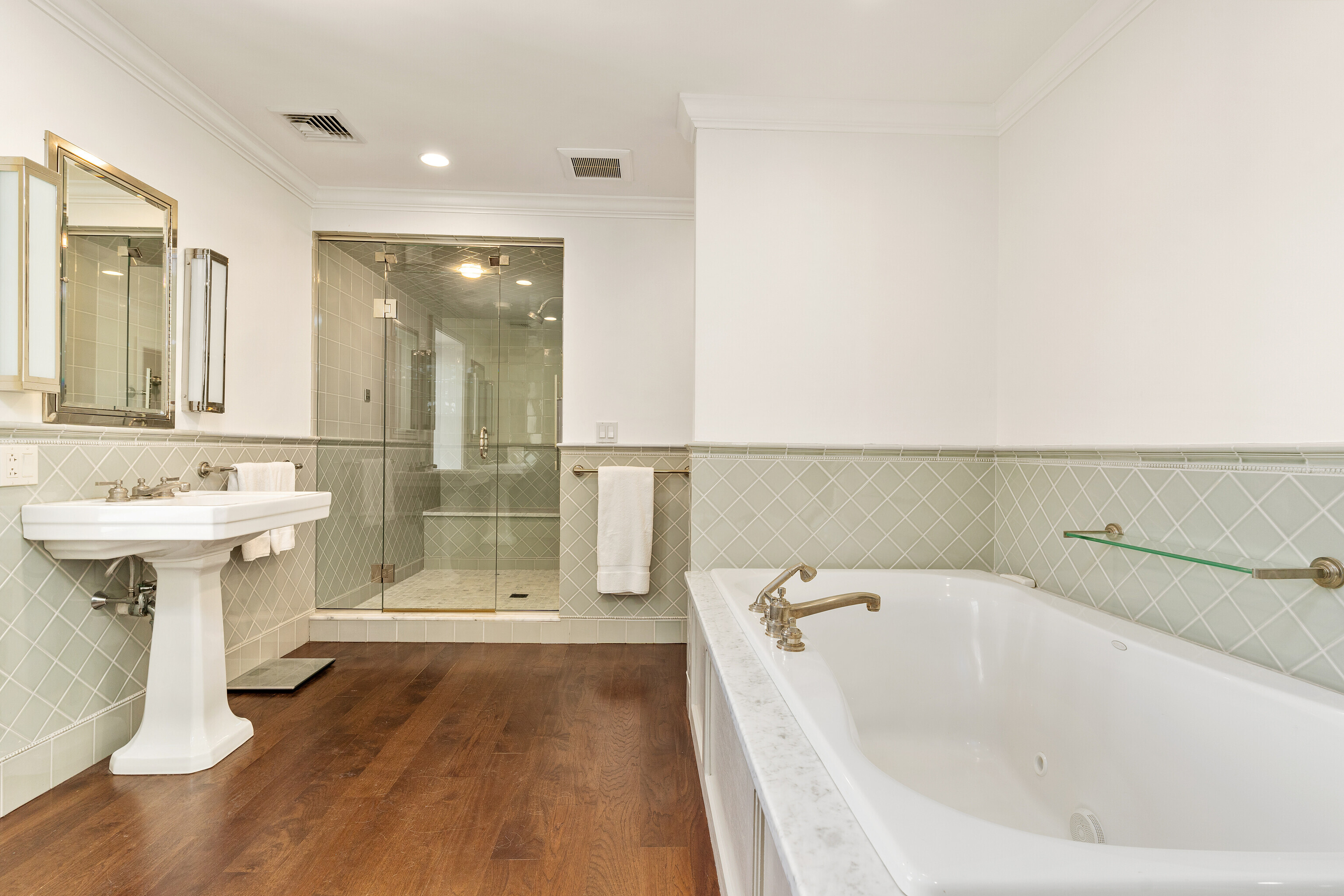 75 Saddle Rock Road Stamford, CT 06902 - Photo 24 of 40 a bathroom with a bathtub a sink and a shower