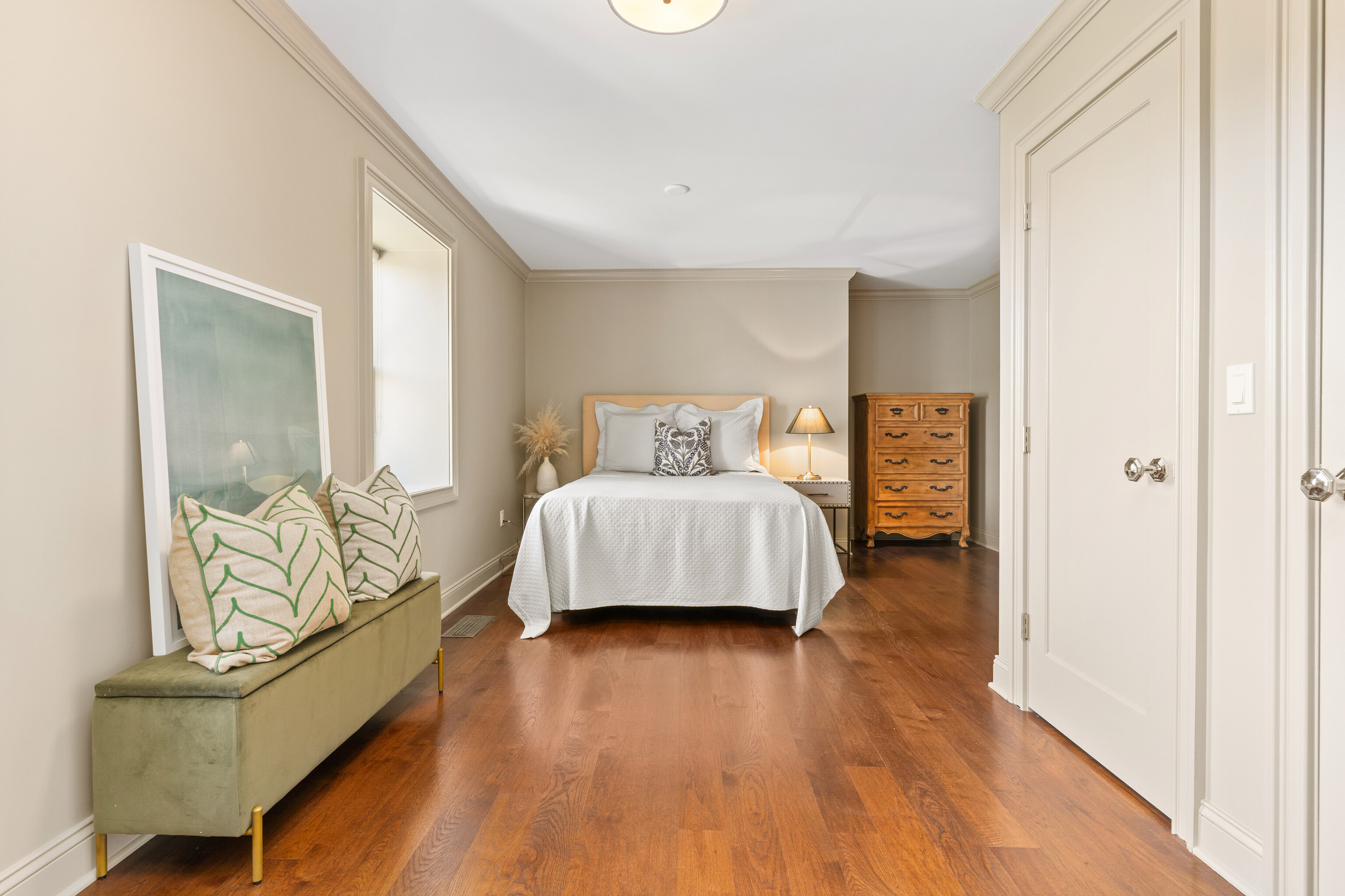 75 Saddle Rock Road Stamford, CT 06902 - Photo 31 of 40 a spacious bedroom with a bed and wooden floor