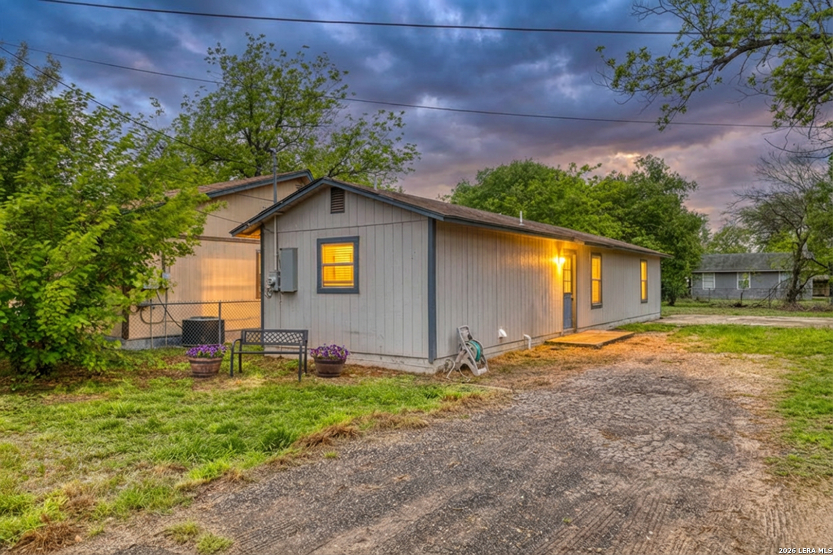 640 Roach Street Uvalde, TX 78801 - Photo 20 of 23 a front view of a house with garden