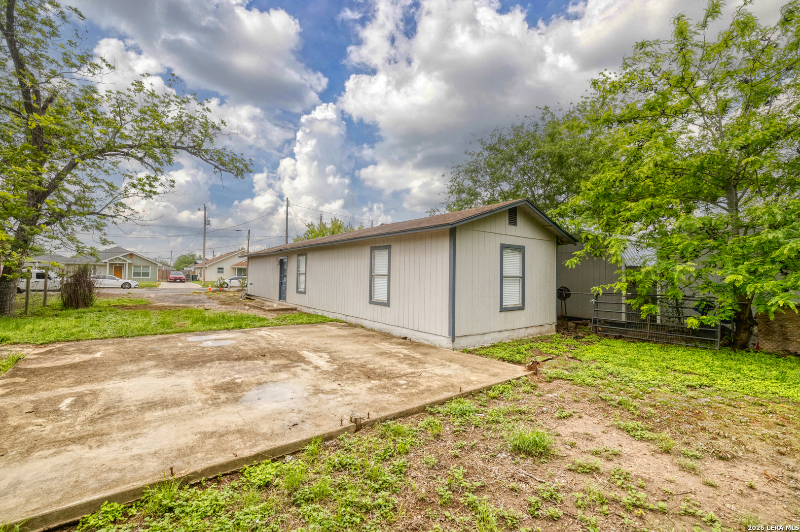 640 Roach Street Uvalde, TX 78801 - Photo 22 of 23 a bathroom with a sink and a yard