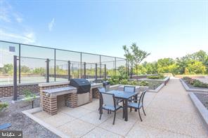 1800 Old Meadow Road, Unit 101 McLean, VA 22102 - Photo 14 of 50 a outdoor view with a sitting space