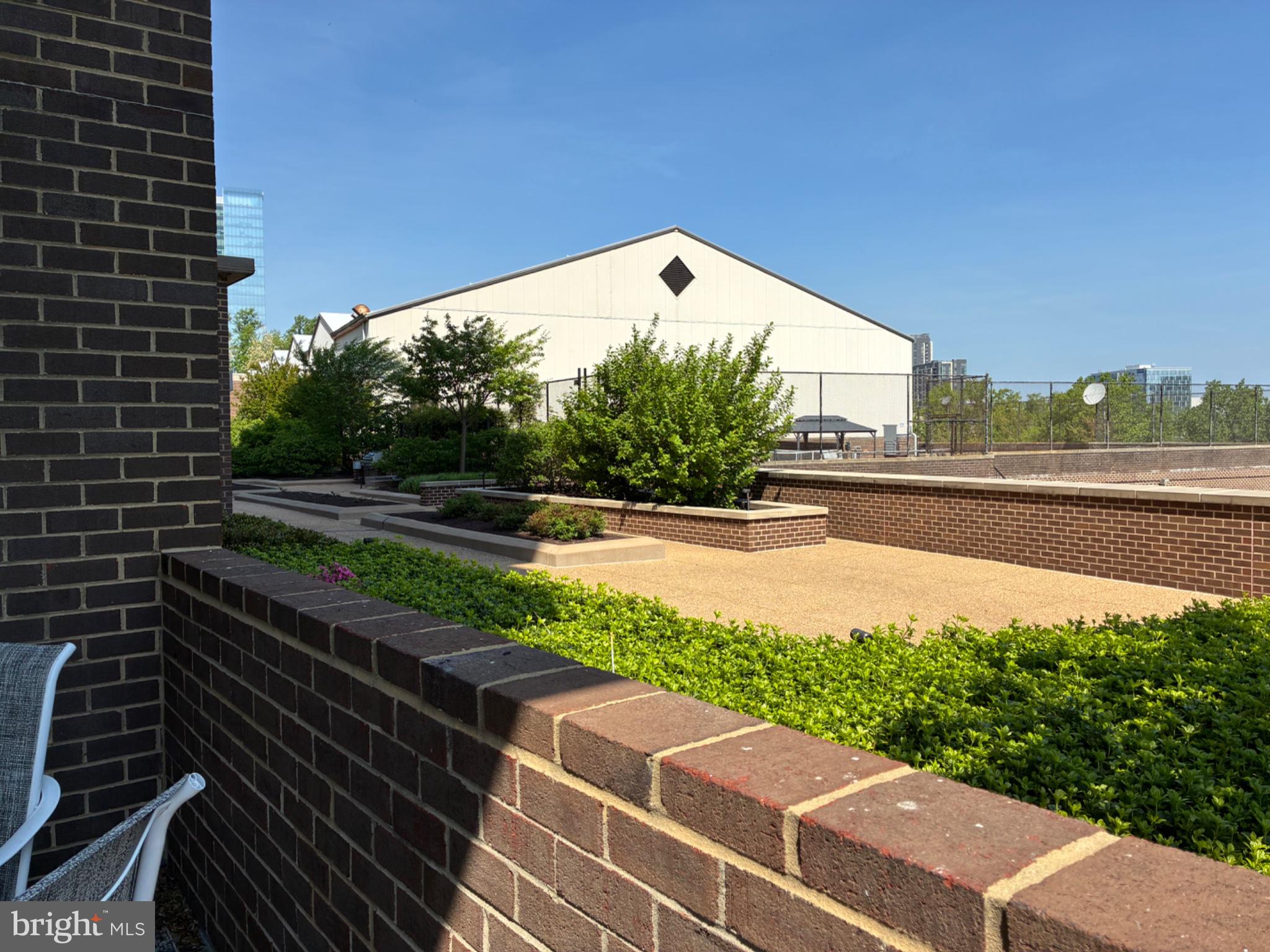 1800 Old Meadow Road, Unit 101 McLean, VA 22102 - Photo 22 of 50 a view of a street with a building in the background