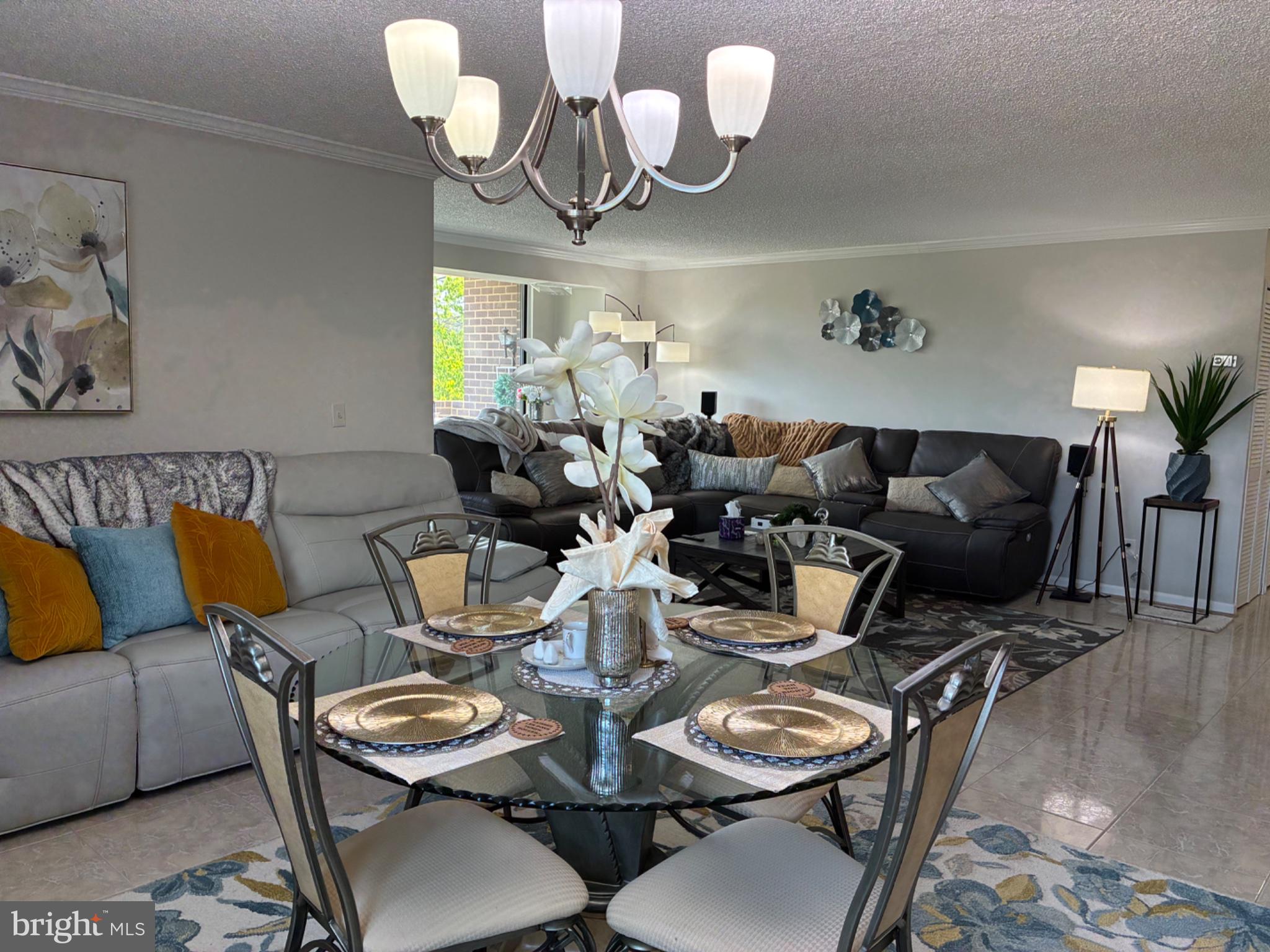 1800 Old Meadow Road, Unit 101 McLean, VA 22102 - Photo 29 of 50 a very nice looking dining room with furniture