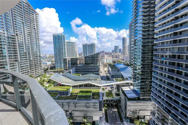 a view of a city with tall buildings