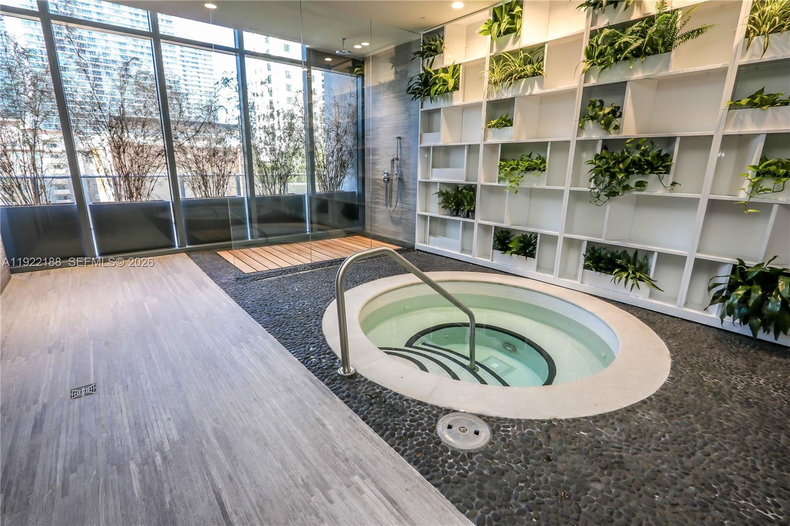 45 Southwest 9th Street, Unit 2201 Miami, FL 33130 - Photo 29 of 36 a room with furniture and large windows