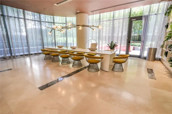 a view of a living room with furniture