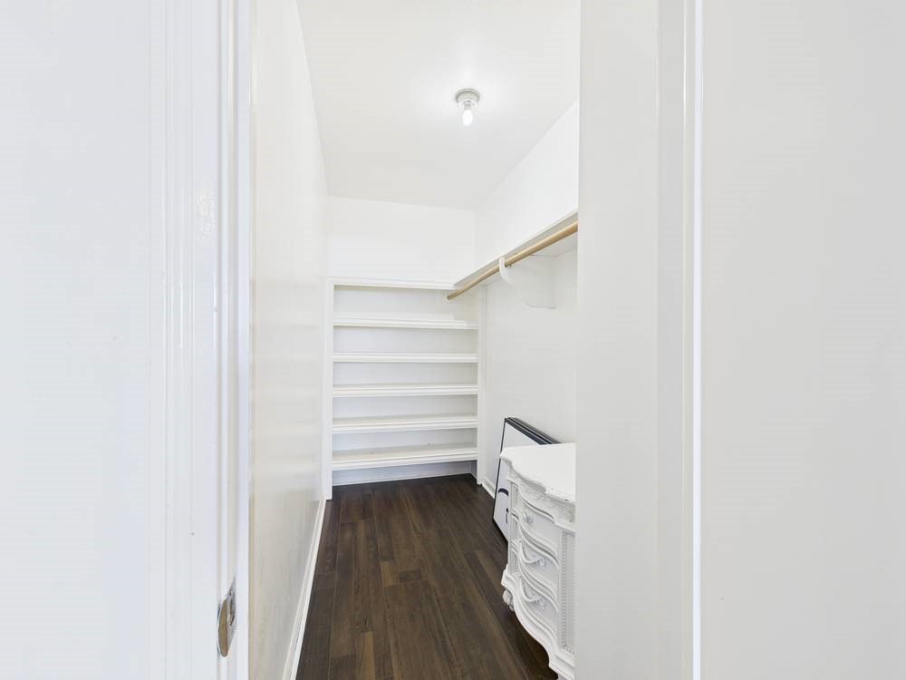 8315 Lichen Lane Spring, TX 77379 - Photo 28 of 31 a view of a hallway with wooden floor and entryway