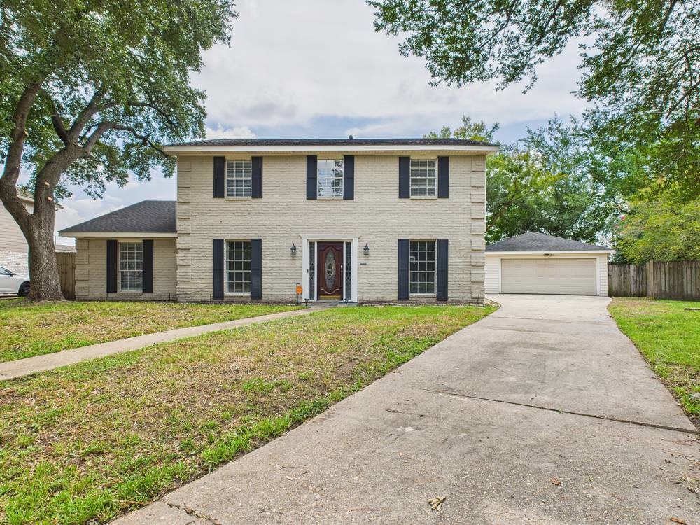 8315 Lichen Lane Spring, TX 77379 - Photo 4 of 31 front view of house with a yard