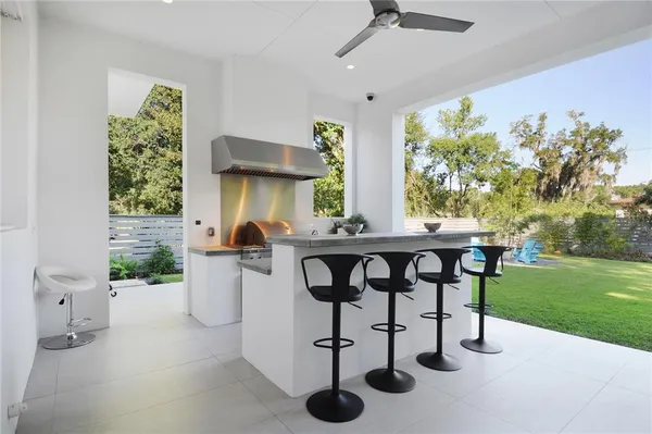 a view of a balcony with furniture