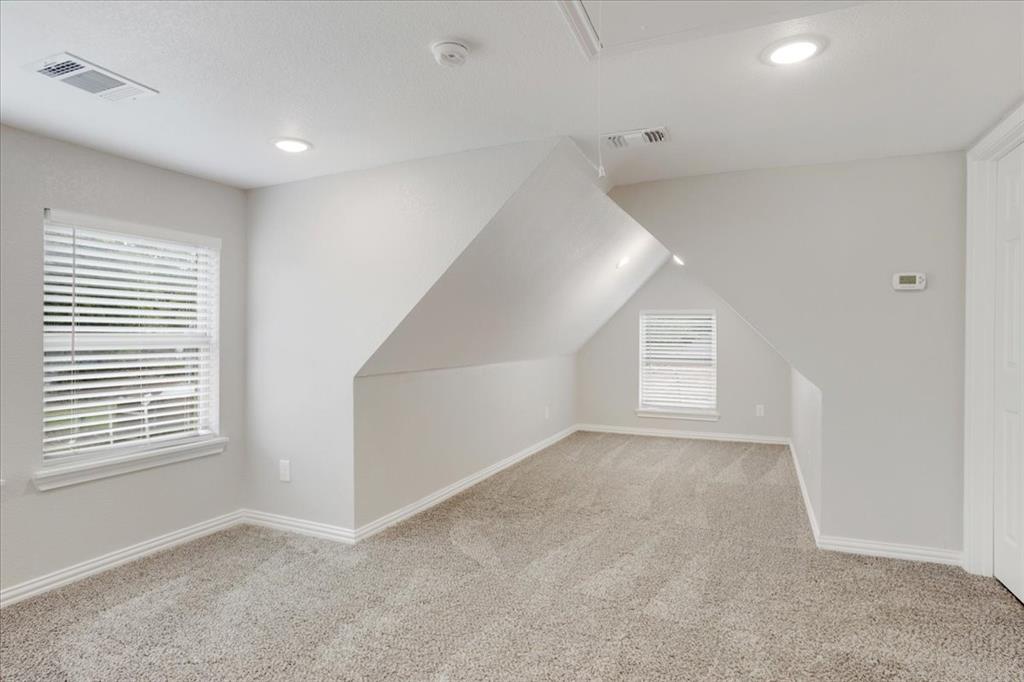 721 Maple Street Bonham, TX 75418 - Photo 20 of 30 an empty room with windows