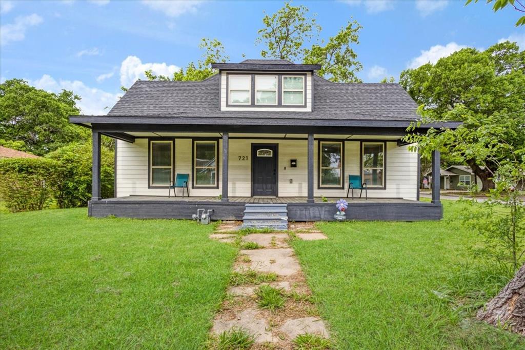 721 Maple Street Bonham, TX 75418 - Photo 2 of 30 a view of a house with swimming pool and a yard