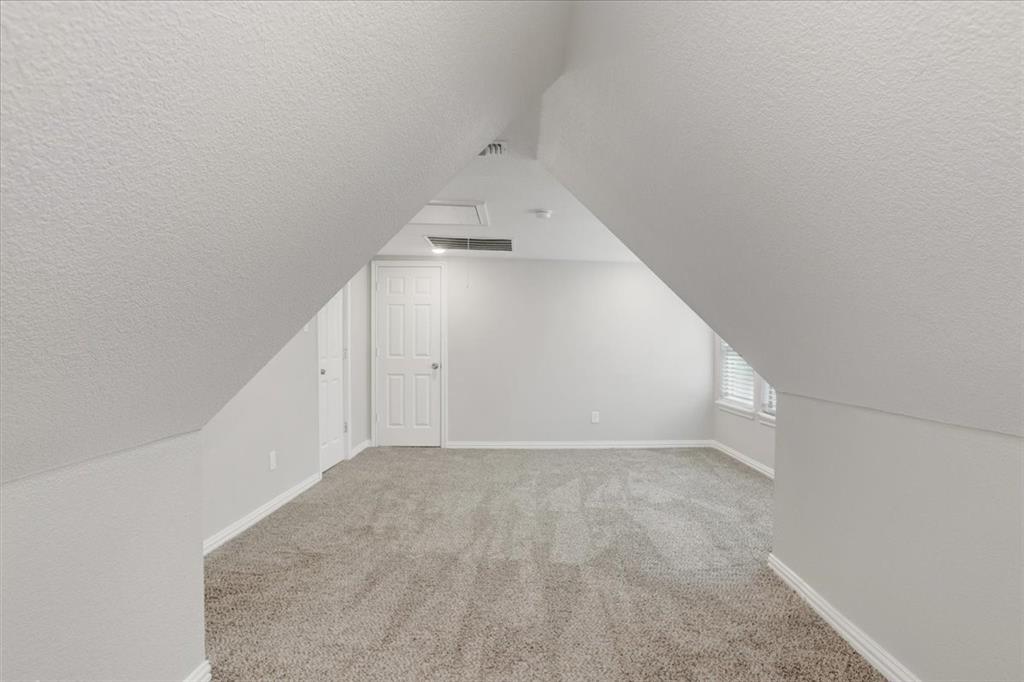 721 Maple Street Bonham, TX 75418 - Photo 21 of 30 an empty room with a natural light