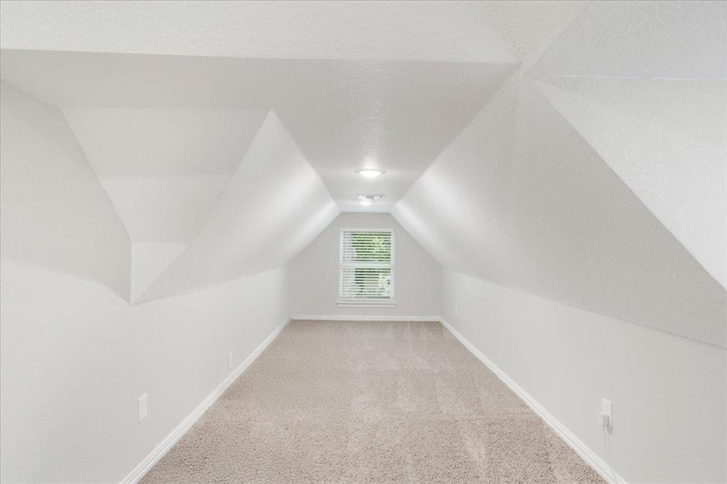 721 Maple Street Bonham, TX 75418 - Photo 22 of 30 a view of an empty room with a window