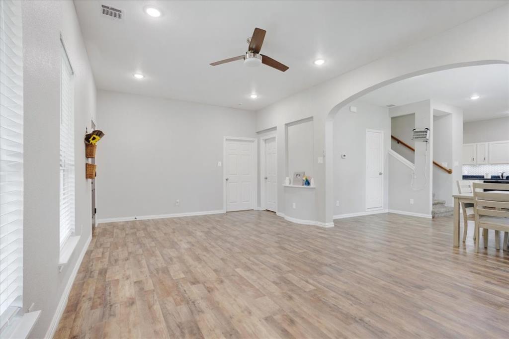 721 Maple Street Bonham, TX 75418 - Photo 5 of 30 a view of empty room with wooden floor