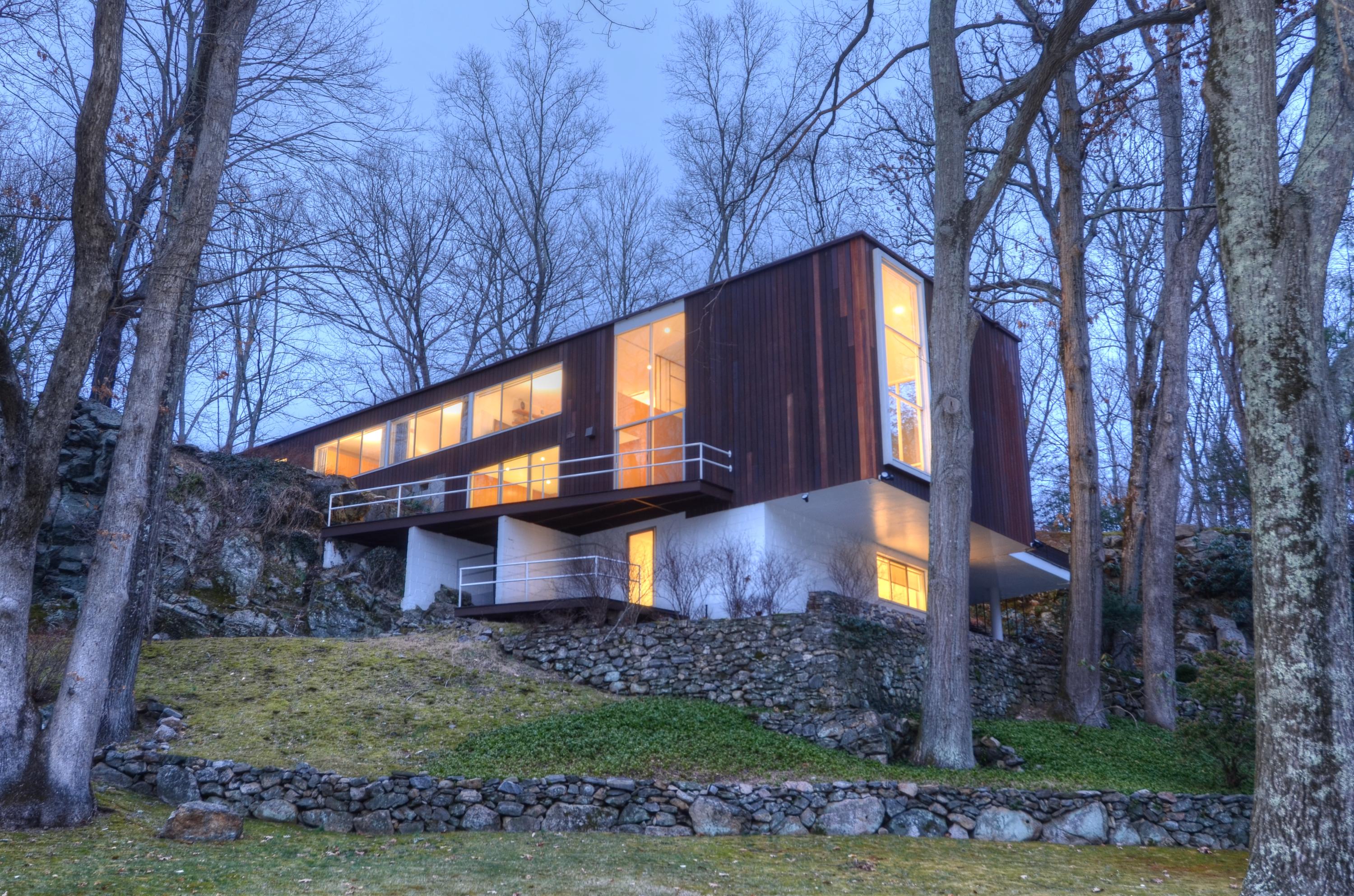 1380 Ponus Ridge Road New Canaan, CT 06840 - Photo 1 of 22 a view of a house with a yard