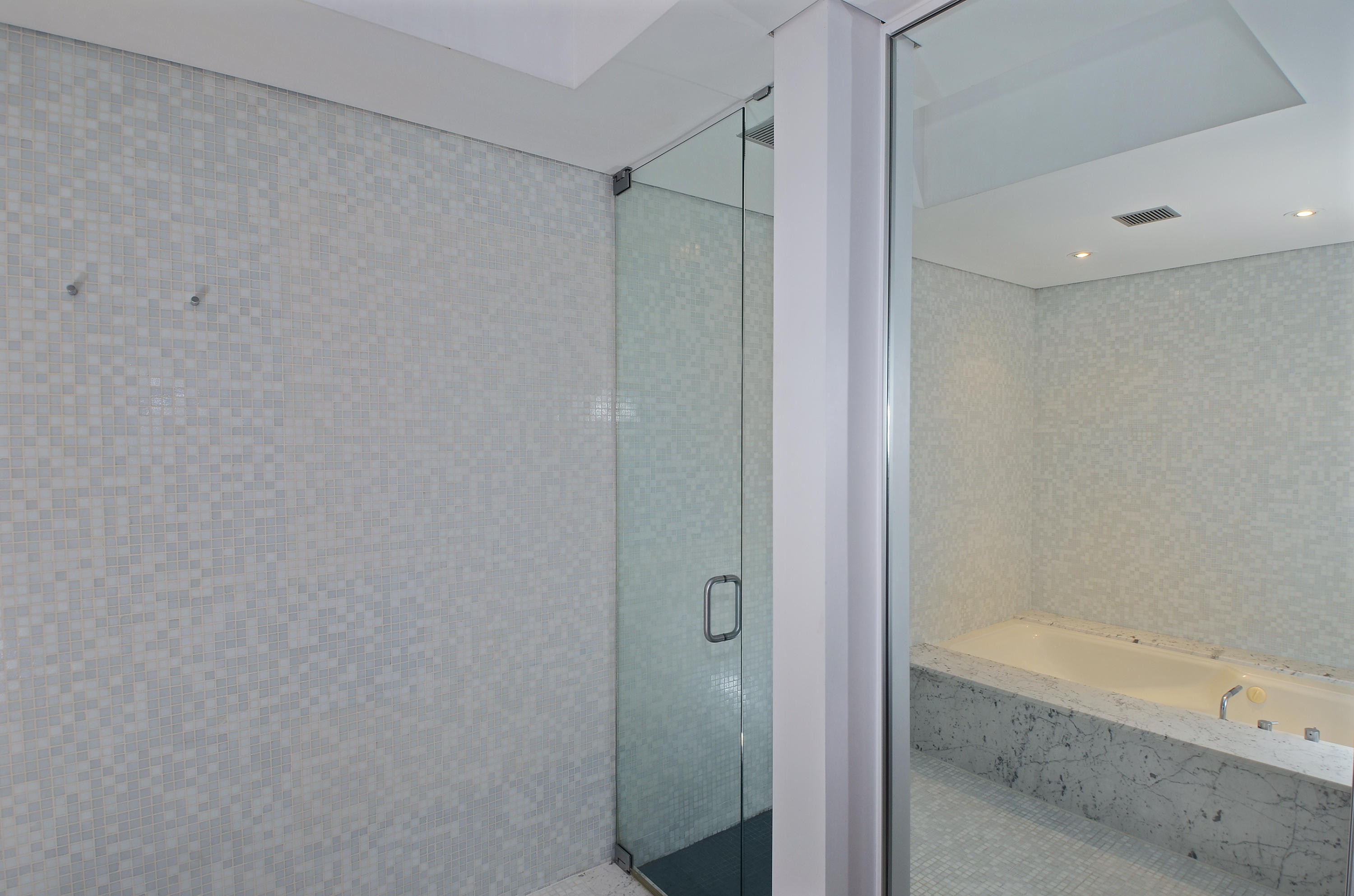 1380 Ponus Ridge Road New Canaan, CT 06840 - Photo 13 of 22 a bathroom with a bathtub and a shower