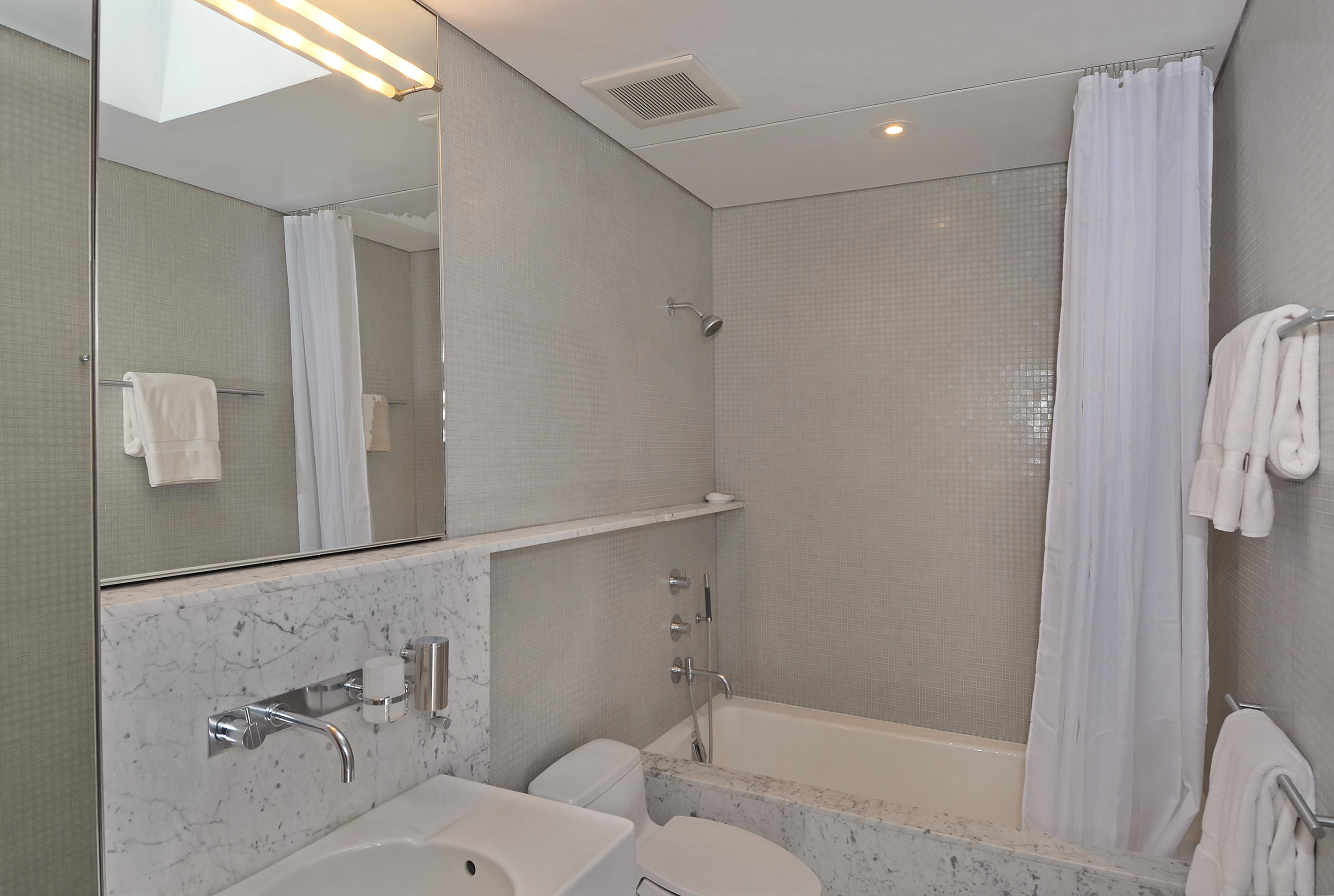 1380 Ponus Ridge Road New Canaan, CT 06840 - Photo 15 of 22 a bathroom with a toilet and shower