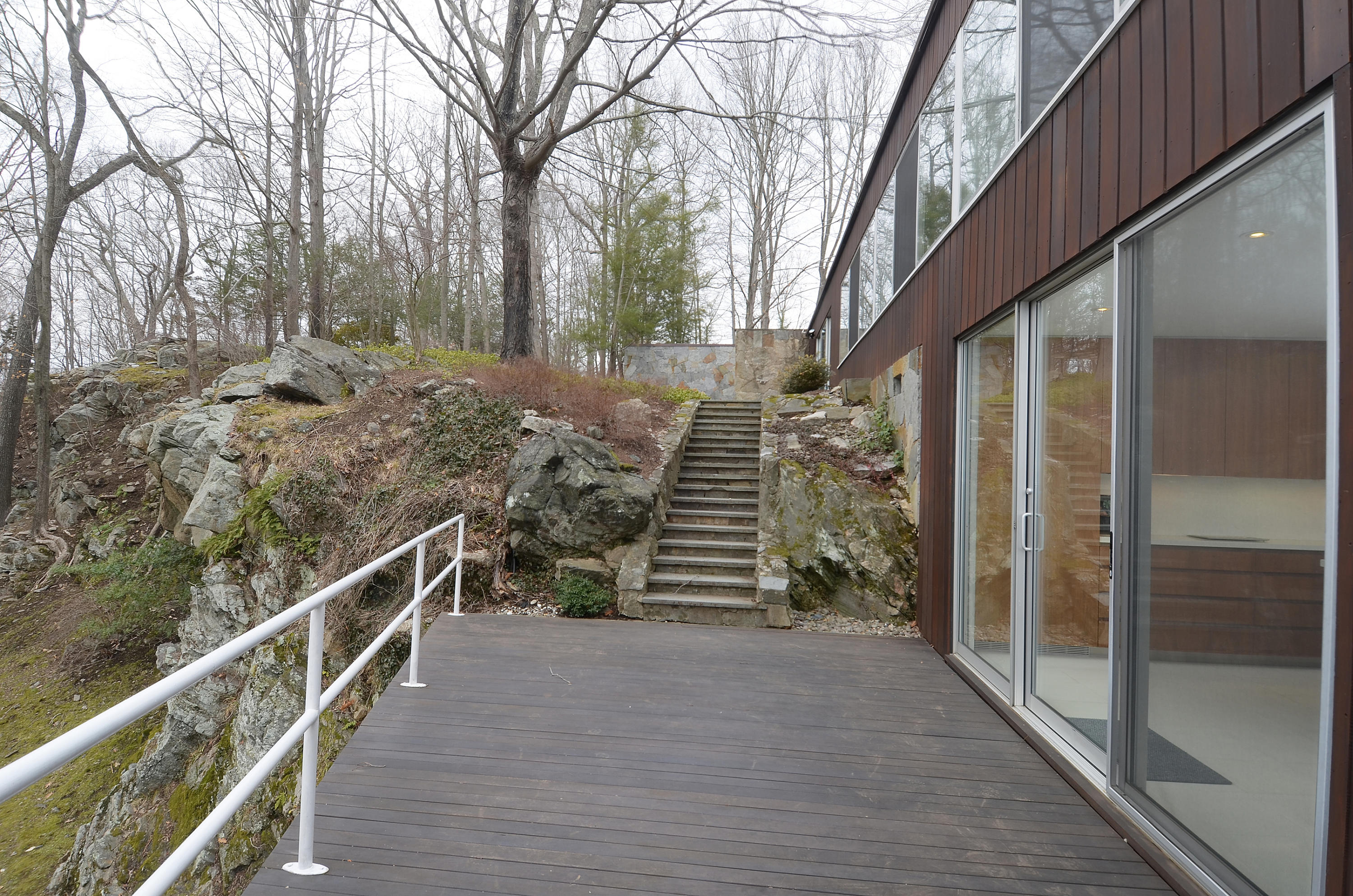 1380 Ponus Ridge Road New Canaan, CT 06840 - Photo 16 of 22 a view of a pathway of a house
