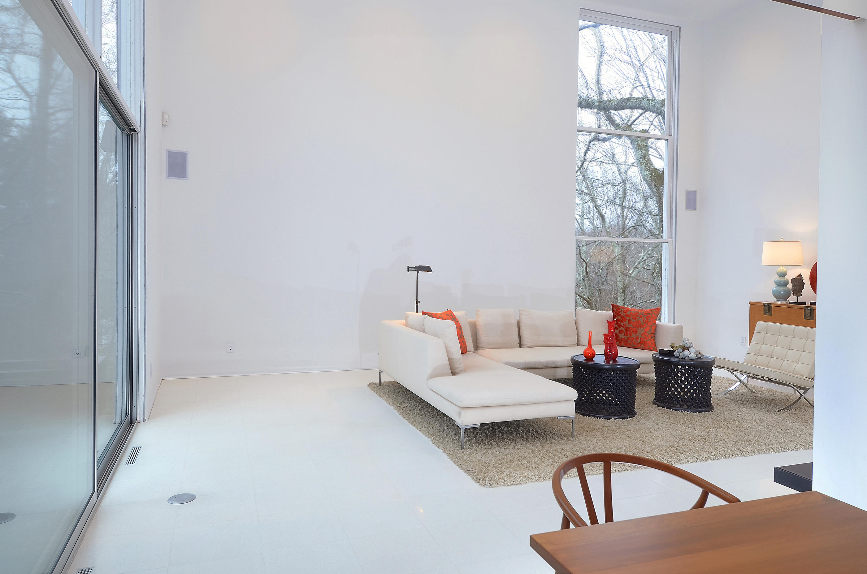 1380 Ponus Ridge Road New Canaan, CT 06840 - Photo 5 of 22 a living room with furniture and a large window