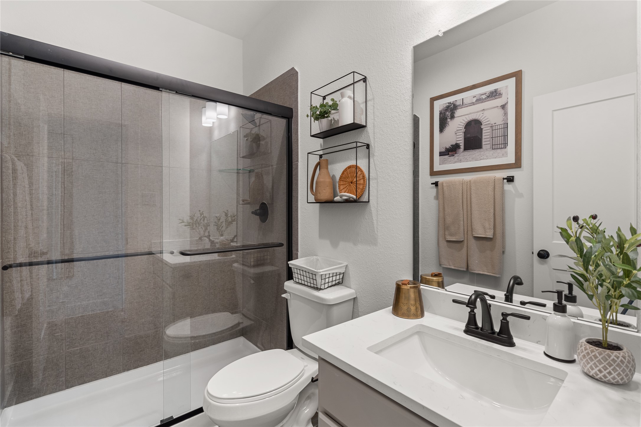 5255 Celestial Court Iowa Colony, TX 77583 - Photo 20 of 29 a bathroom with a sink a toilet and shower