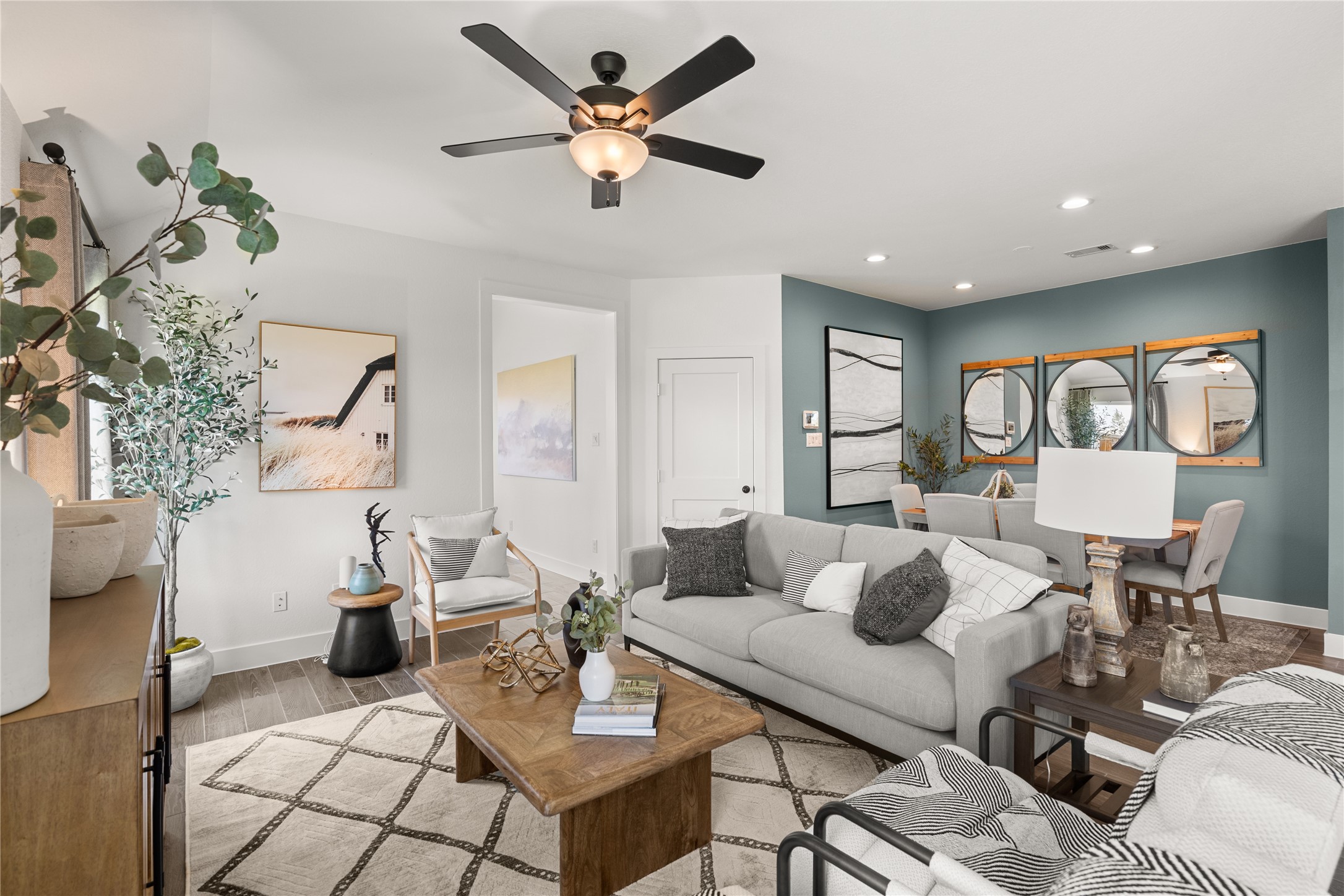 5255 Celestial Court Iowa Colony, TX 77583 - Photo 13 of 29 a living room with furniture and a chandelier