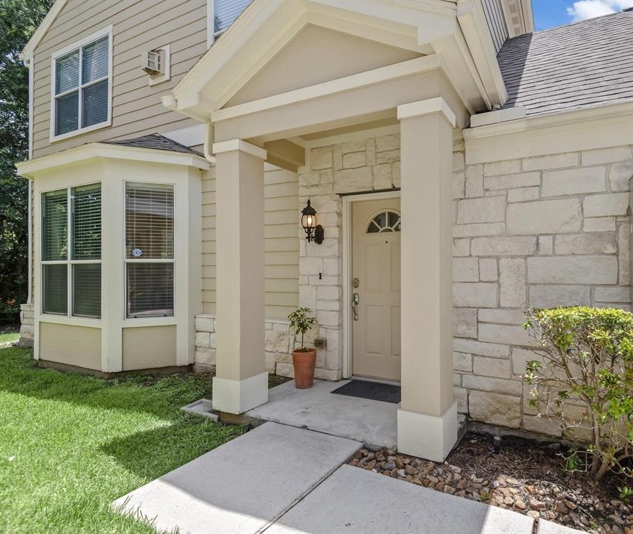 13600 Breton Ridge Street, Unit 24A Houston, TX 77070 - Photo 20 of 24 Beautiful Limestone and on the exterior.