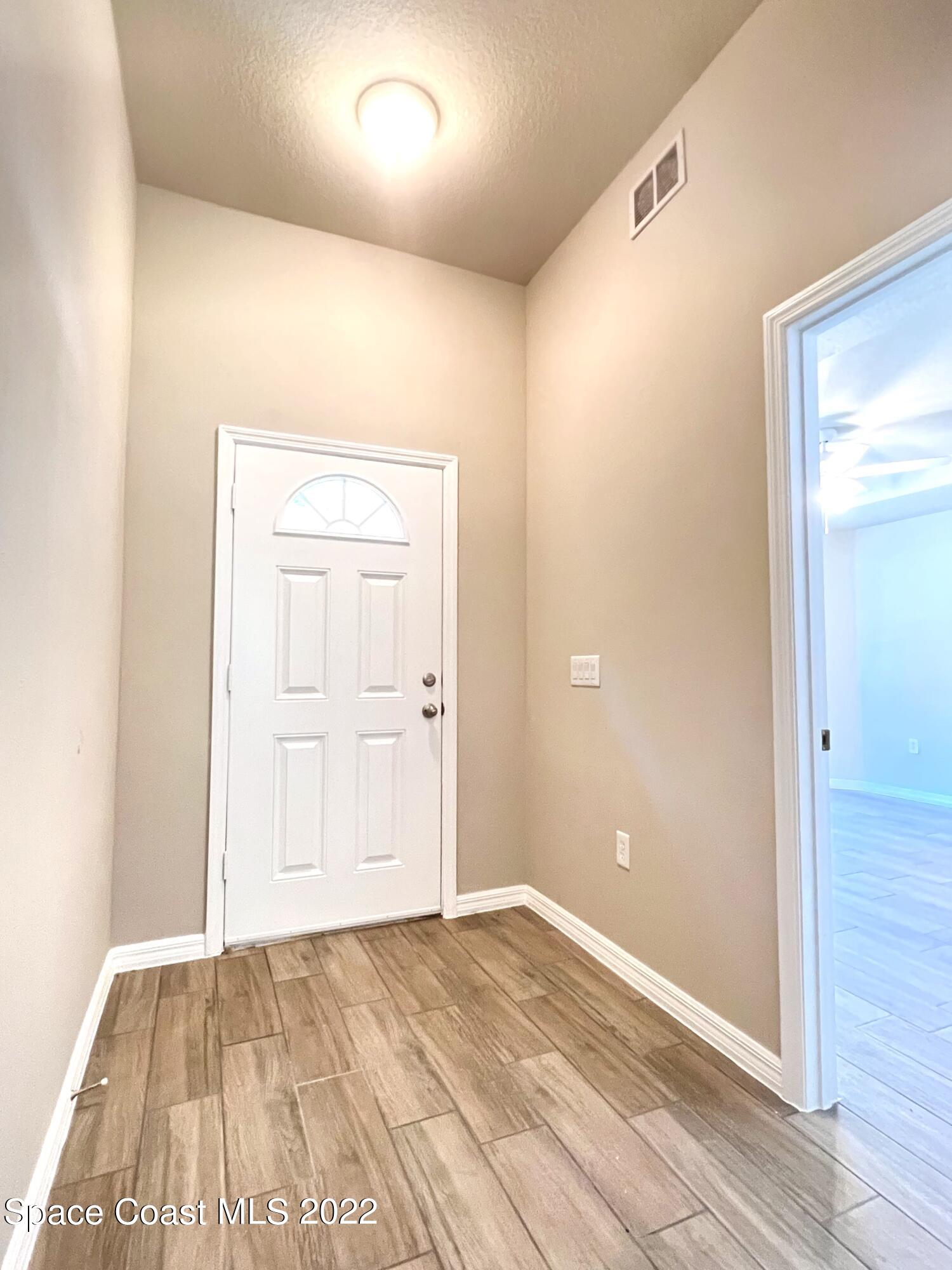 449 Alison Street Titusville, FL 32780 - Photo 2 of 18 a view of empty room