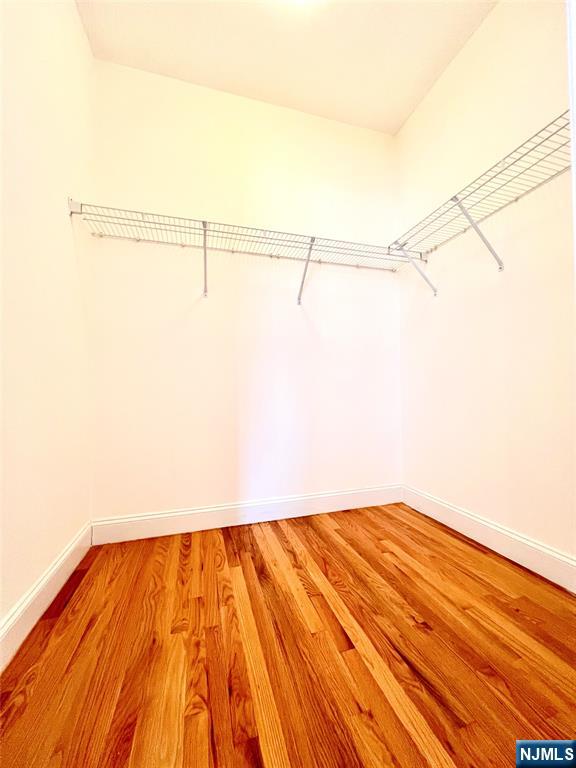 1100 River Road, Unit 206 Edgewater, NJ 07020 - Photo 8 of 13 a view of a room with wooden floor