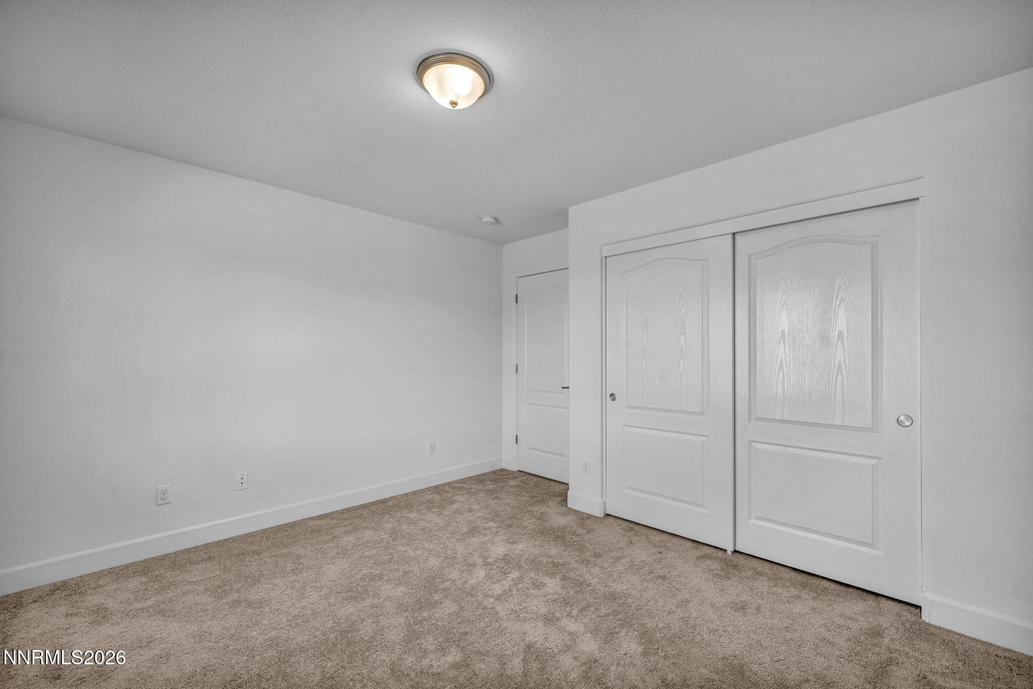 7181 Saddlehorn Road Carson City, NV 89701 - Photo 29 of 62 an empty room with closet area