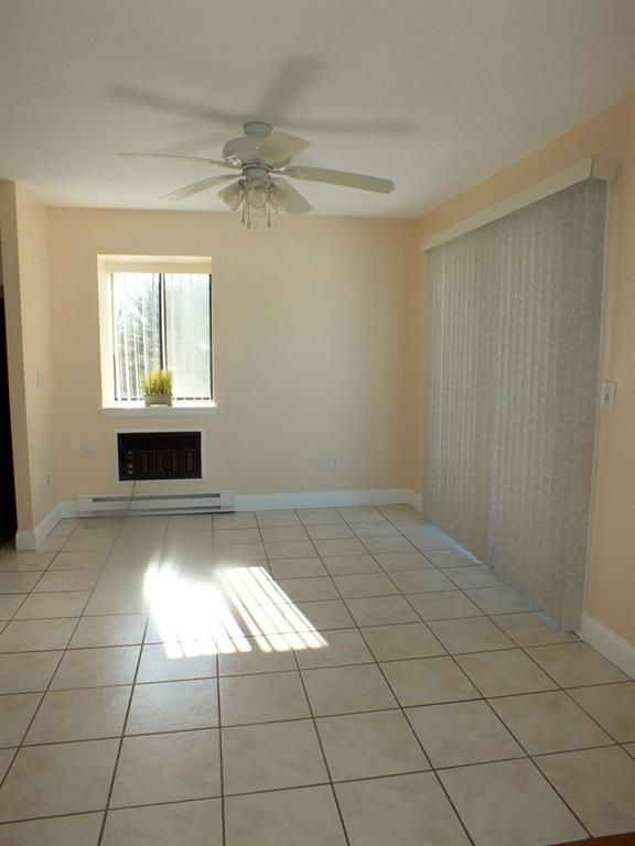 93 Kent Court, Unit 93 Meriden, CT 06450 - Photo 7 of 27 a view of an empty room and window
