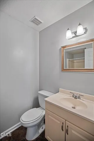 a bathroom with a glass door shower